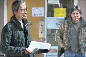 Rocky Tomma, with his brother Ron Tomma, stands outside the Little Shuswap Indian Band administration office Monday. 