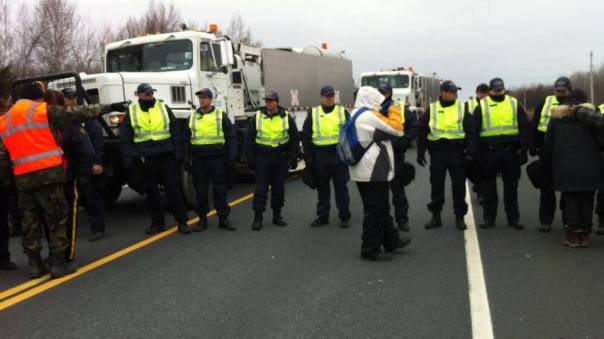 RCMP protecting SWN vehicles, Nov 14, 2013.