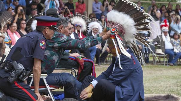 Prime Minister Stephen Harper is made an honorary chief of the Blood tribe, Standoff, Alberta, July 11, 2011.