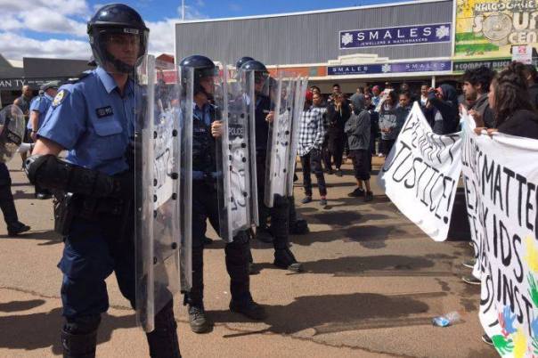 Elijah Doughty riot cops banners